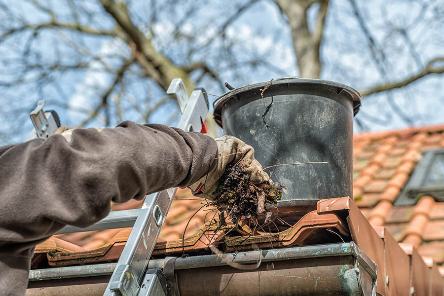 unclogging gutters