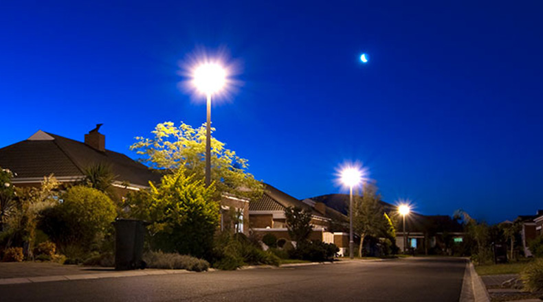 Street at night with street lights on